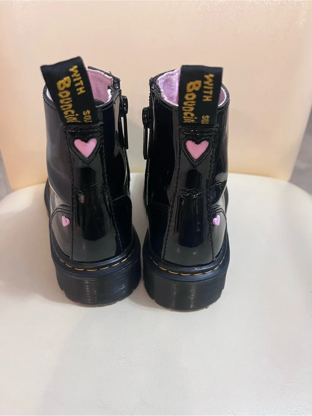 Kids Dr. Martens Black Patent Heart Accent Boots with Pink Lining